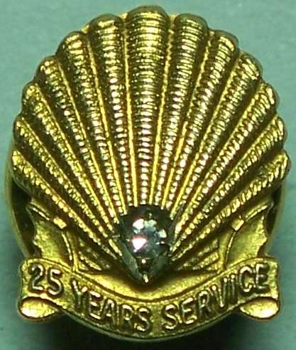 Shell Oil Company gold lapel badge for 25 years service 1955