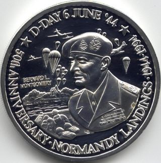 Coin image of reverse of a 5 ounces silver Turks and Caicos islands General Montgomery 50th anniversary d-day landings 100 crowns 1994