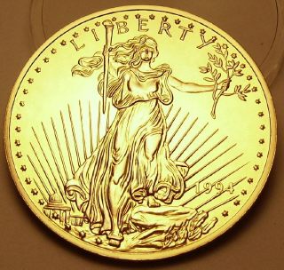 Ingot image of obverse of a 8 ounces gold plated solid .999 silver USA Washington Mint St. Gaudens Eagle
