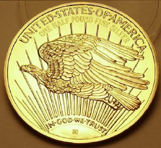 Ingot image of reverse of a 8 ounces gold plated solid .999 silver USA Washington Mint St. Gaudens Eagle